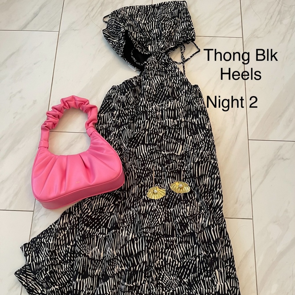 Amazing dress! Like brand new. Amazing for summer travel and dinners!